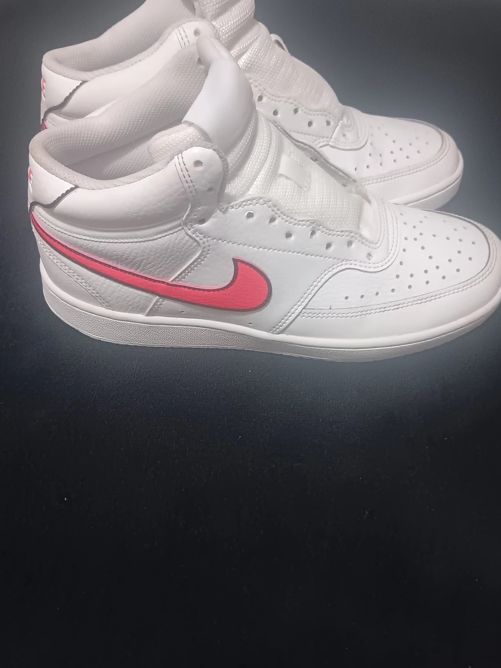 Nike Women’s White High-Top Sneakers with Pink Swoosh